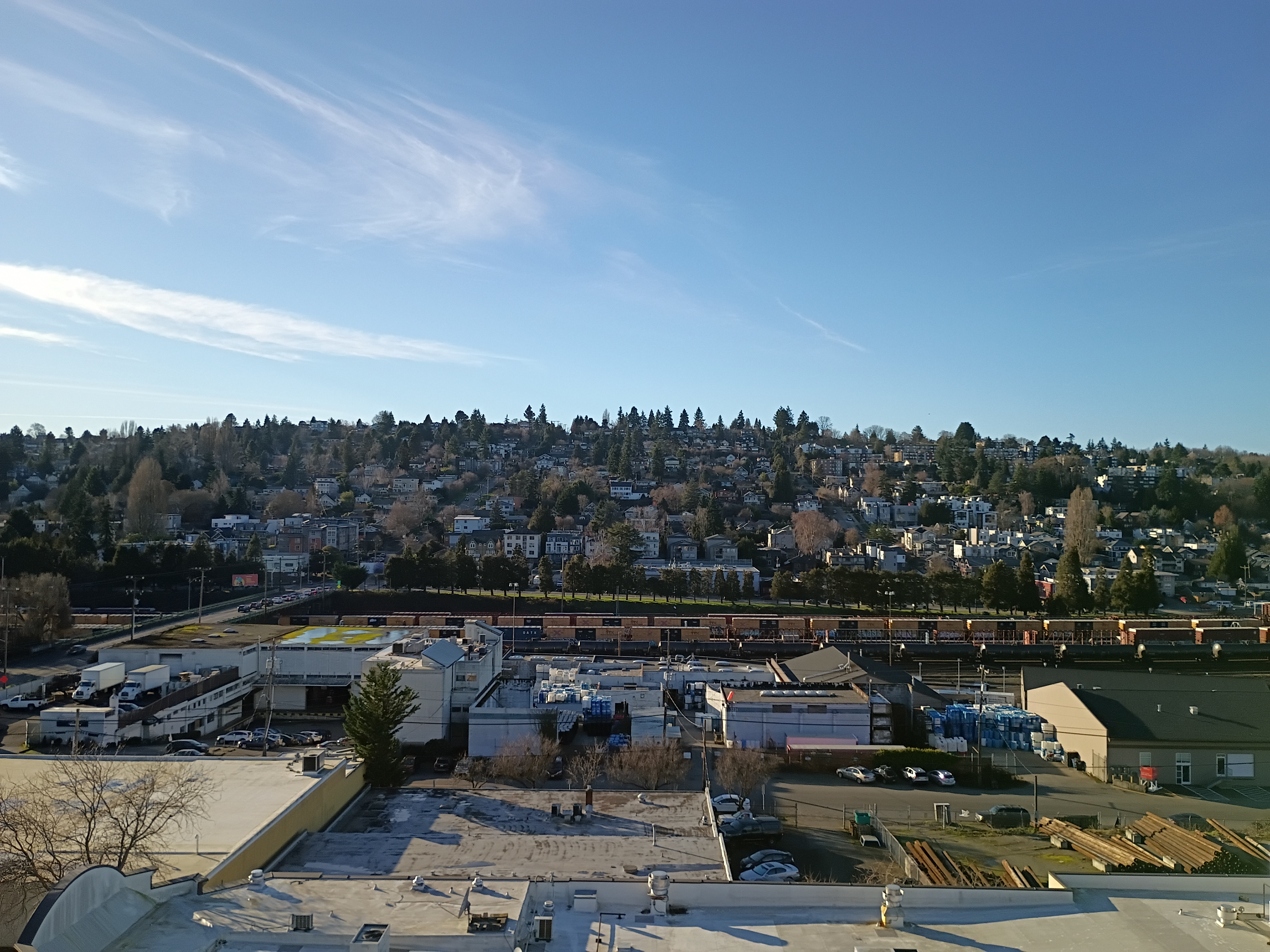 A hillside with many homes