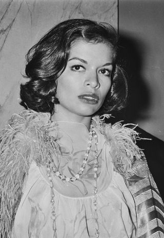 Model and actress Bianca Jagger attends the first night of the musical 'Billy' at the Drury Lane Theatre in London, UK, 3rd May 1974