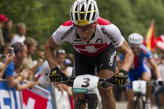 Nino Schurter (Switzerland) races to a silver medal in Champery at the Worlds
