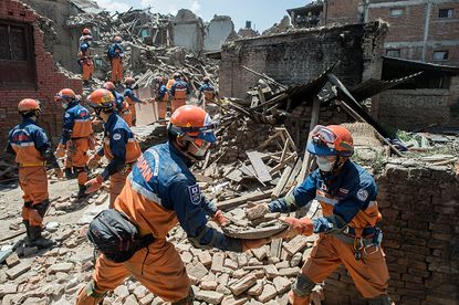 Japanese rescuers work in Nepal.