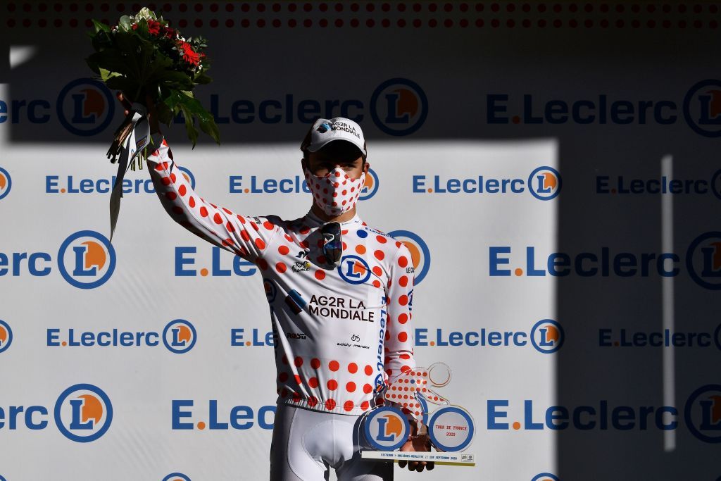 Team AG2R La Mondiale rider Frances Benoit Cosnefroy celebrates his best climbers polka dot jersey on the podium after the 4th stage of the 107th edition of the Tour de France cycling race 157 km between Sisteron and OrcieresMerlette on September 1 2020 Photo by AnneChristine POUJOULAT AFP Photo by ANNECHRISTINE POUJOULATAFP via Getty Images