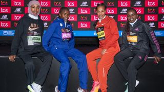 Sifan Hassan, Brigid Kosgei, Yalemzerf Yehualaw and Peres Jepchirchir pose for a photo together at the TCS London Marathon media centre the Friday before the race