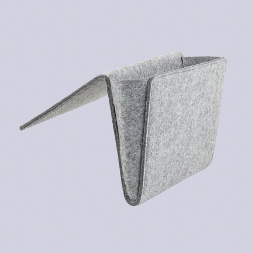 A grey felt pocket shaped to fit over the arm of a chair or sofa