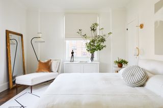 An all-white bedroom