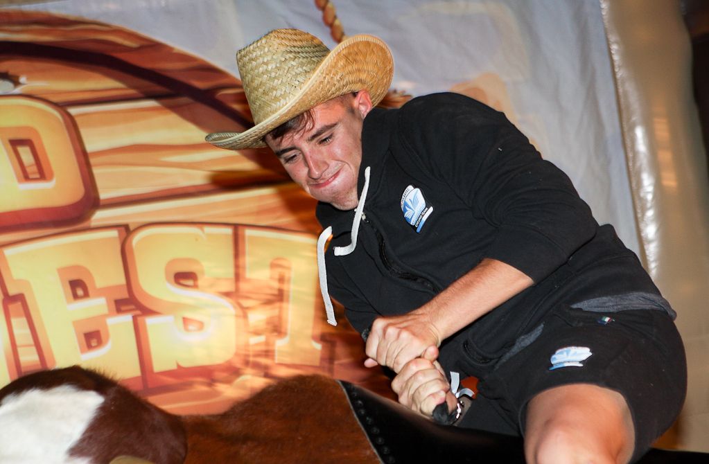 Mechanical bull riding is not easy