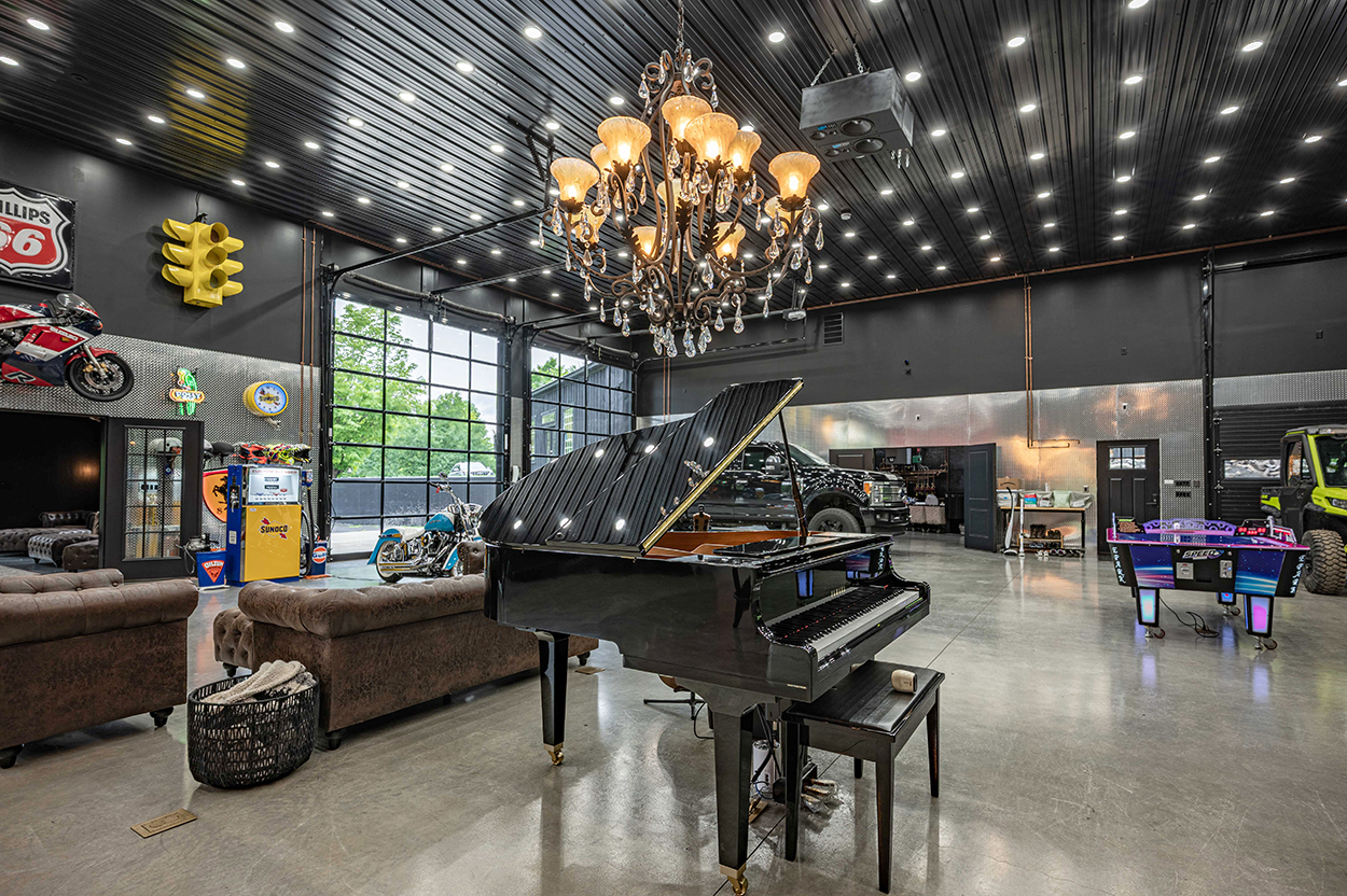 A baby grand piano inside an entertaining space at a home
