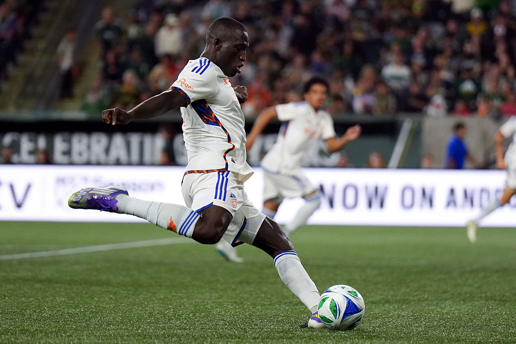 Kevin Denkey #9 of FC Cincinnati takes a shot on goal during the second half against the Portland Timbers at Providence Park on August 16, 2025 in Portland, Oregon.
