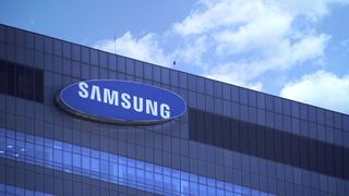 Samsung sign on headquarter building with sky in background
