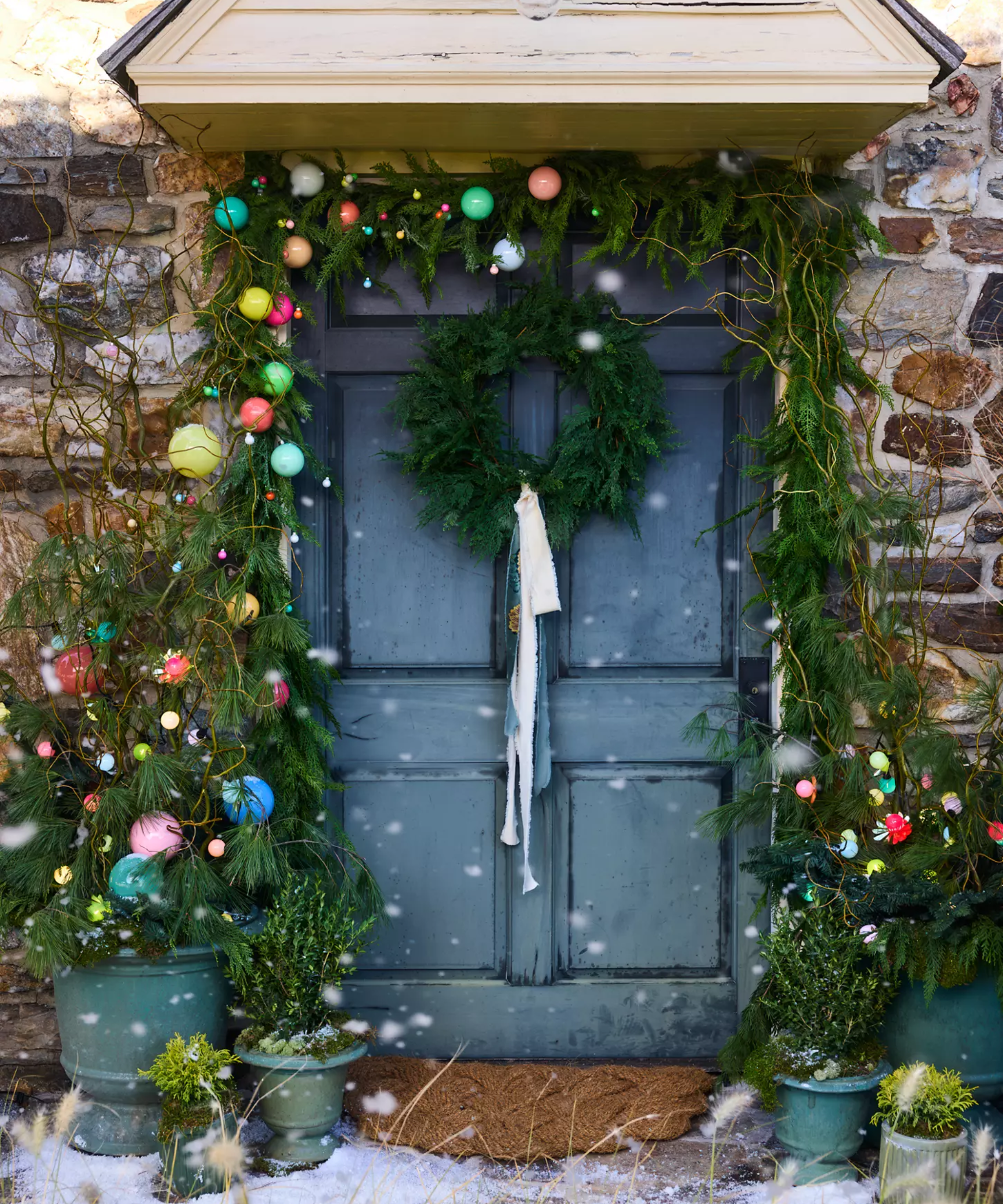 a porch decorated for Christmas