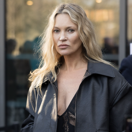 Kate Moss attends the Stella McCartney Womenswear Fall/Winter 2025-2026 show as part of Paris Fashion Week on March 05, 2025 in Paris, France wearing skinny jeans and platform mules