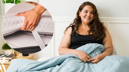 A woman with a bigger build sits up in bed smiling. To the left, an insert showing a close up of a hand holding the corner of a thin mattress or thick mattress topper