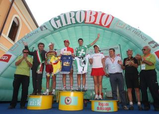 Riders stand on the podium following stage four of the Baby Giro.