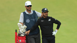 Abraham Ancer and his caddie