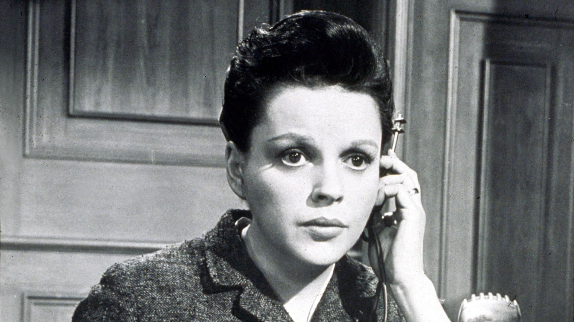 Judy Garland listening to a translating device in Judgment at Nuremberg