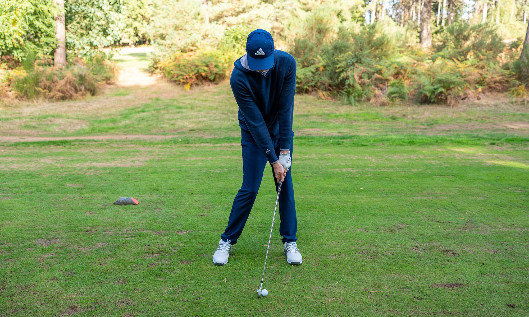 Ben Emerson at impact with an iron