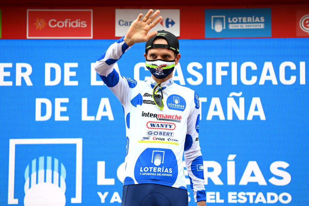 ALBACETE SPAIN AUGUST 18 Rein Taaramae of Estonia and Team Intermarch Wanty Gobert Matriaux celebrates winning the Polka Dot Mountain Jersey on the podium ceremony after during the 76th Tour of Spain 2021 Stage 5 a 1844km stage from Tarancn to Albacete lavuelta LaVuelta21 on August 18 2021 in Albacete Spain Photo by Stuart FranklinGetty Images