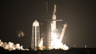 A SpaceX Falcon 9 rocket and Crew Dragon spacecraft lift off for the Crew-1 mission to the International Space Station.