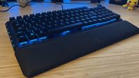 Corsair Vanguard Pro 96 gaming keyboard on a wooden desk 