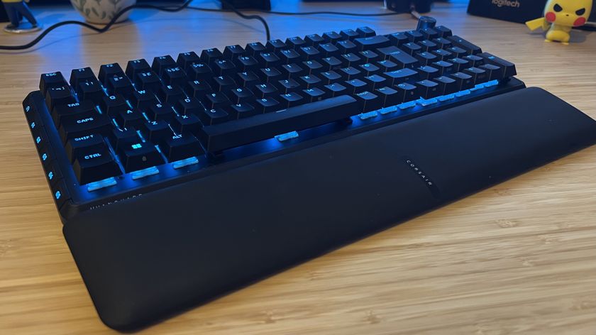 Corsair Vanguard Pro 96 gaming keyboard on a wooden desk 