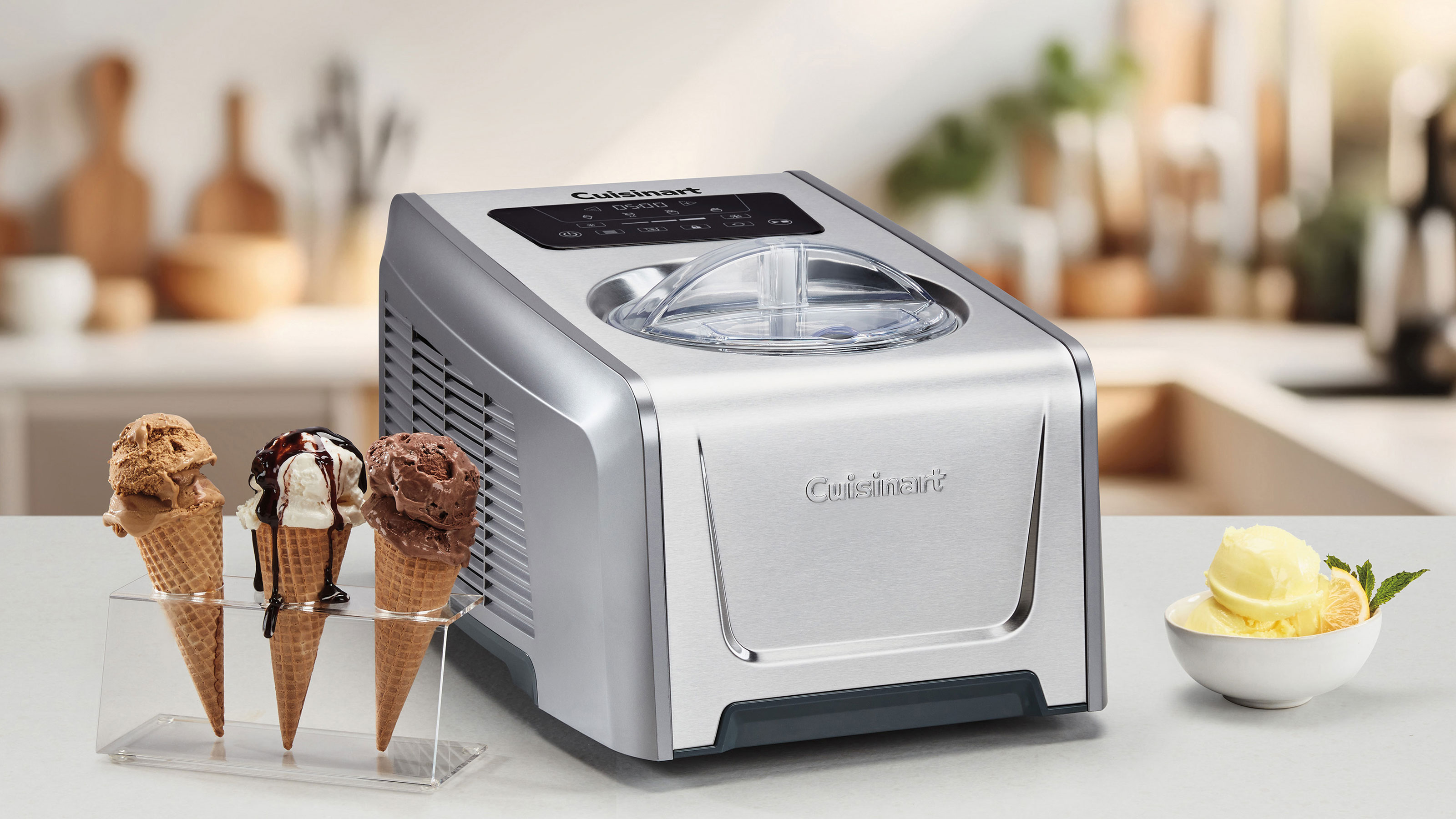 Silver cuisinart ice cream maker on a white kitchen counter