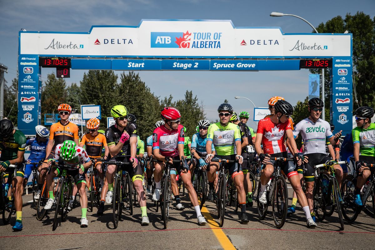 Riders wait for the start of stage 2 at the Tour of Alberta
