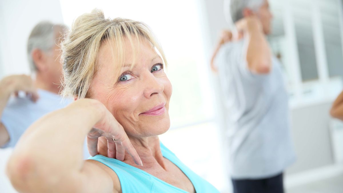 a photo of a woman in her 60&#039;s working out 