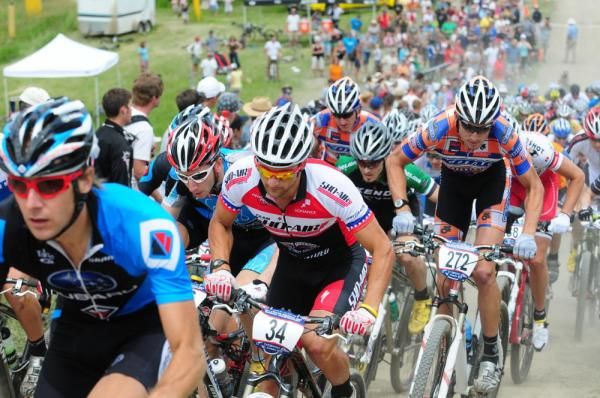 The men start up a steep fireroad.