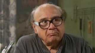 Frank sitting at table after eating peppers with Charlie in It's Always Sunny in Philadelphia Season 17