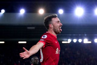 Liverpool’s Diogo Jota celebrates scoring their side’s second goal of the game during the Premier League match at Anfield, Liverpool. Picture date: Saturday November 20, 2021