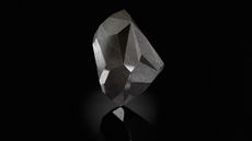 The Enigma diamond, a 555.55 carat black diamond with 55 facets.