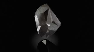 The Enigma diamond, a 555.55 carat black diamond with 55 facets.