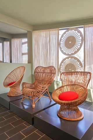 Three rattan chairs at Bonacina Museum