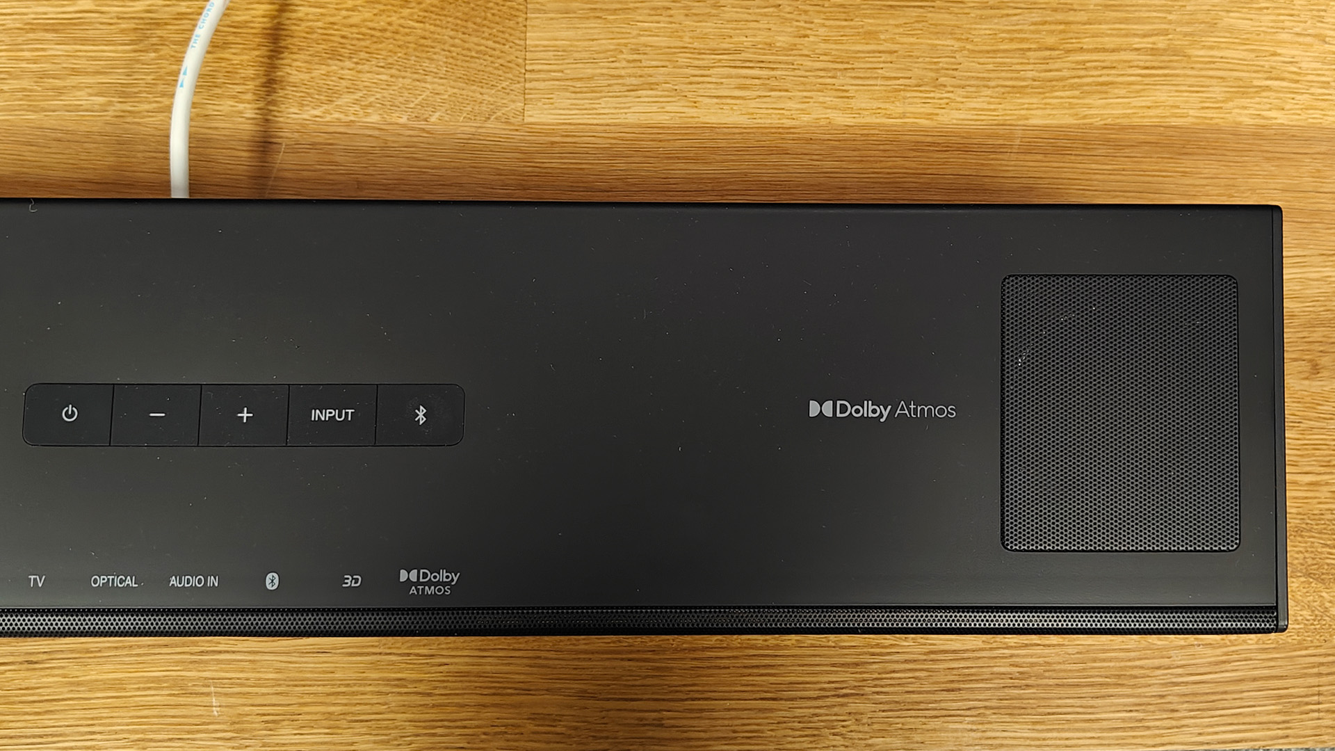 Sharp HT-SB700 Dolby Atmos soundbar top down view showing controls