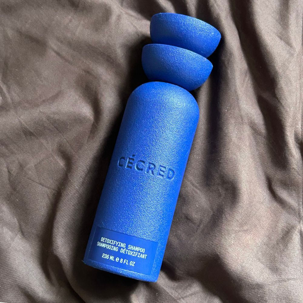A close-up shot of Cécred's Detoxifying Shampoo