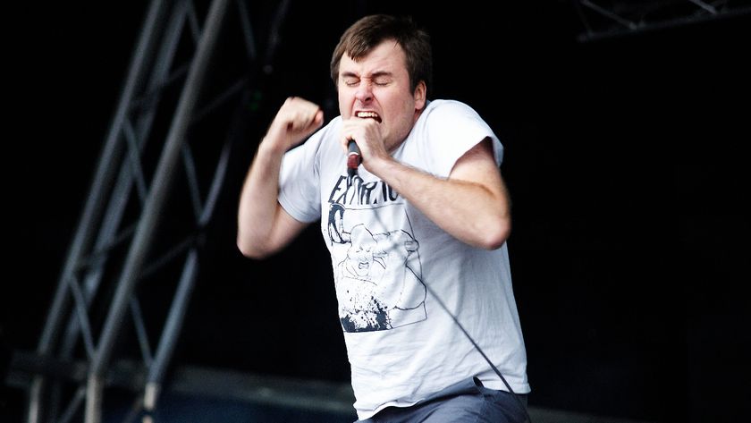 Barney Greenway screaming on stage