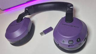 Photo taken by writer Rosalie Newcombe of the Purple Turtle Beach Stealth 600 Gen 3 wireless gaming headset on a white desk.