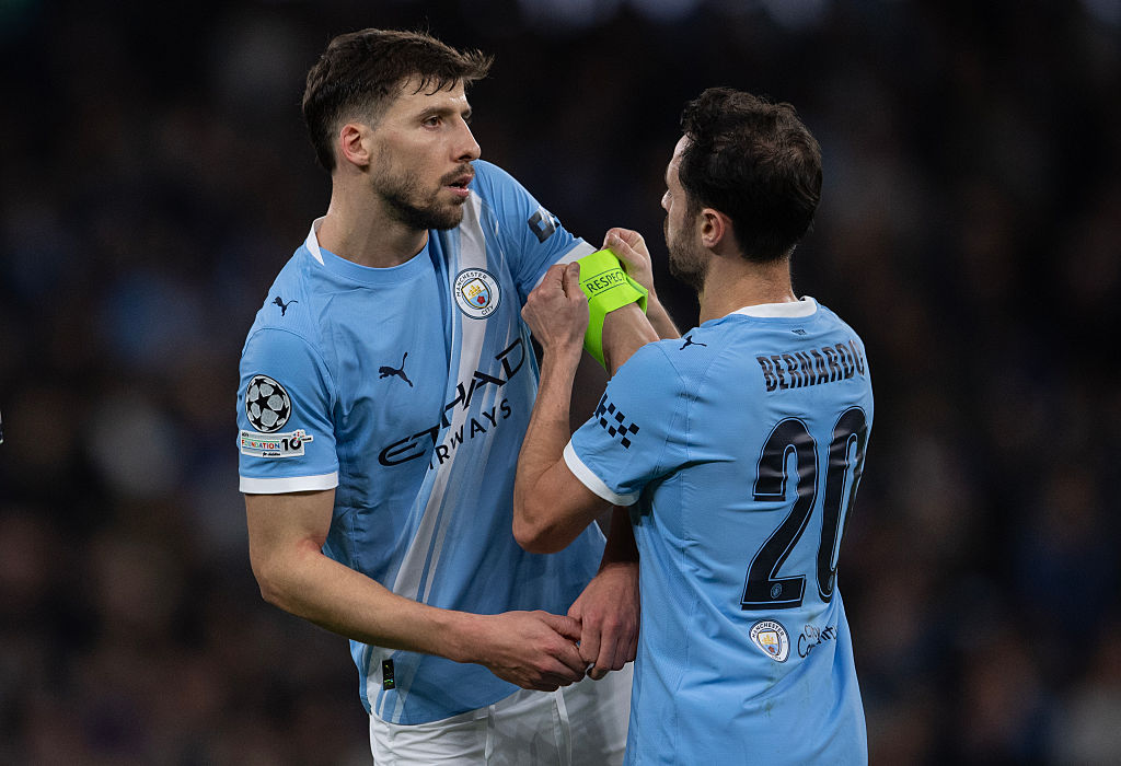 Bernardo Silva gives the captain's armband to Ruben Dias