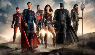 Justice League the entire lineup stands on a hill