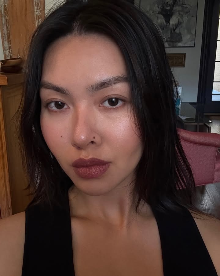 Photo of Mimi Nguyen wearing dark matte lipstick
