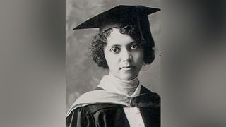 Black and white portrait of Alicia Augusta Ball in her graduation cap and gown.