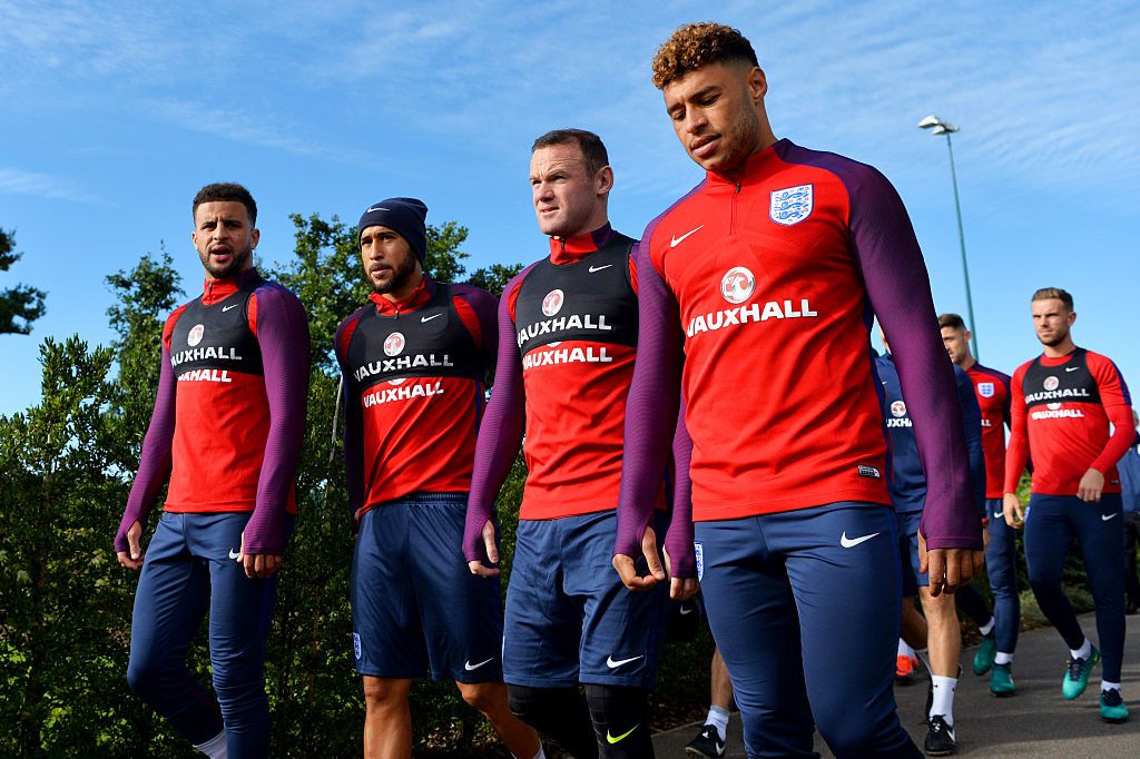 ENFIELD, ENGLAND - OCTOBER 10: (L-R) Kyle Walker, Andros Townsend, Wayne Rooney and Alex Oxlade-Chamberlain walk out for an England training session at the Tottenham Hotspur training ground on October 10, 2016 in Enfield, England. (Photo by Dan Mullan/Getty Images)