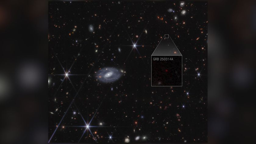 A deep space image showing various colored stars and galaxies, with a boxout showing a supernova with the label GRB 250314A, in white text