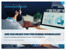 Whitepaper front with title over image of a man sat at a desk looking at charts on a desktop computer