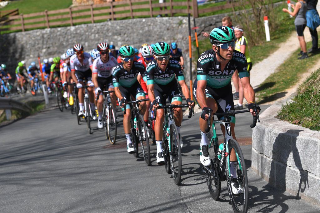 Bora-Hansgrohe lead the peloton on stage 1 of the Tour of the Alps.