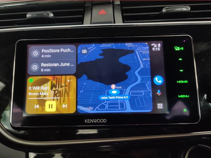 A look at Android Auto's new "Coolwalk" UI split-screen redesign featuring Spotify.
