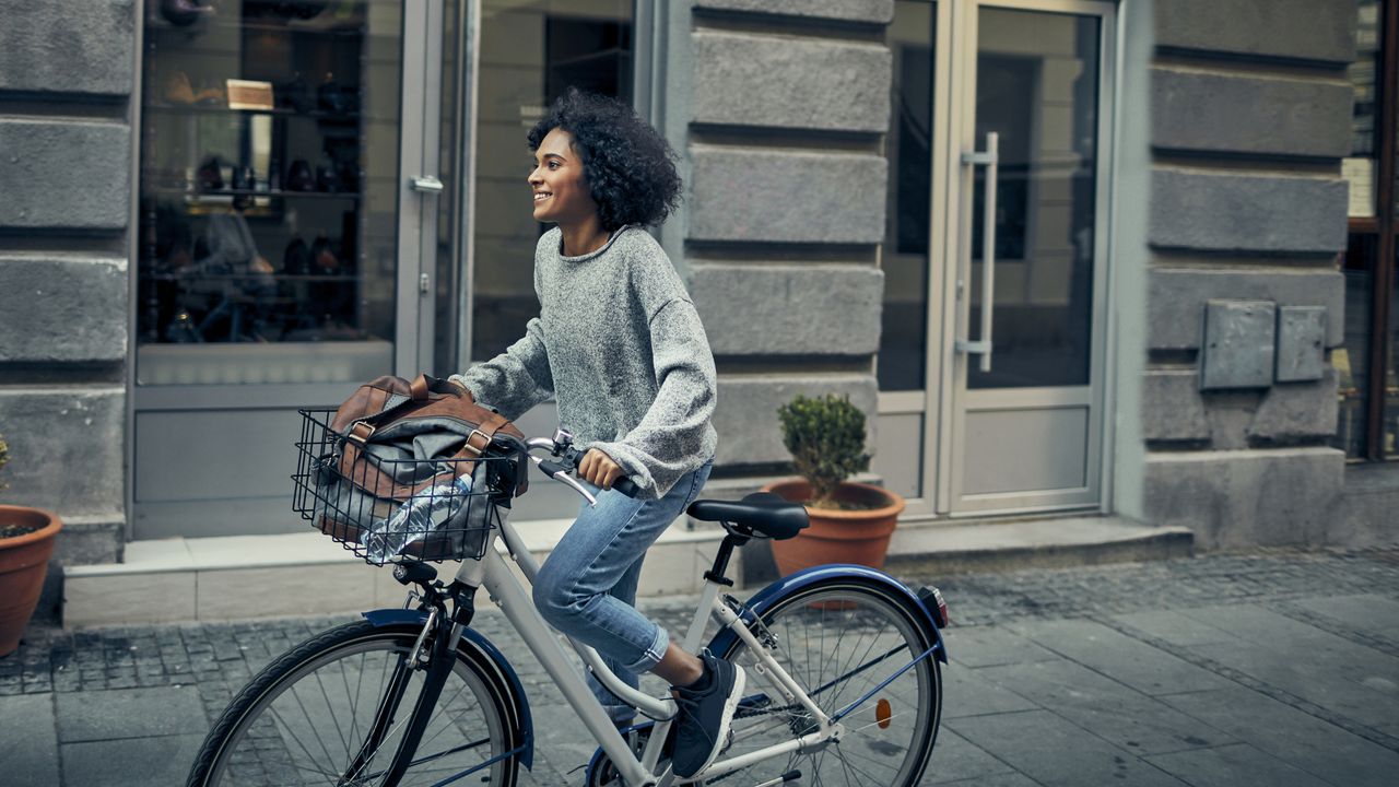 Person cycling on a Dutch bike in the city