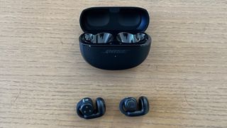 Bose Ultra open earbuds on table