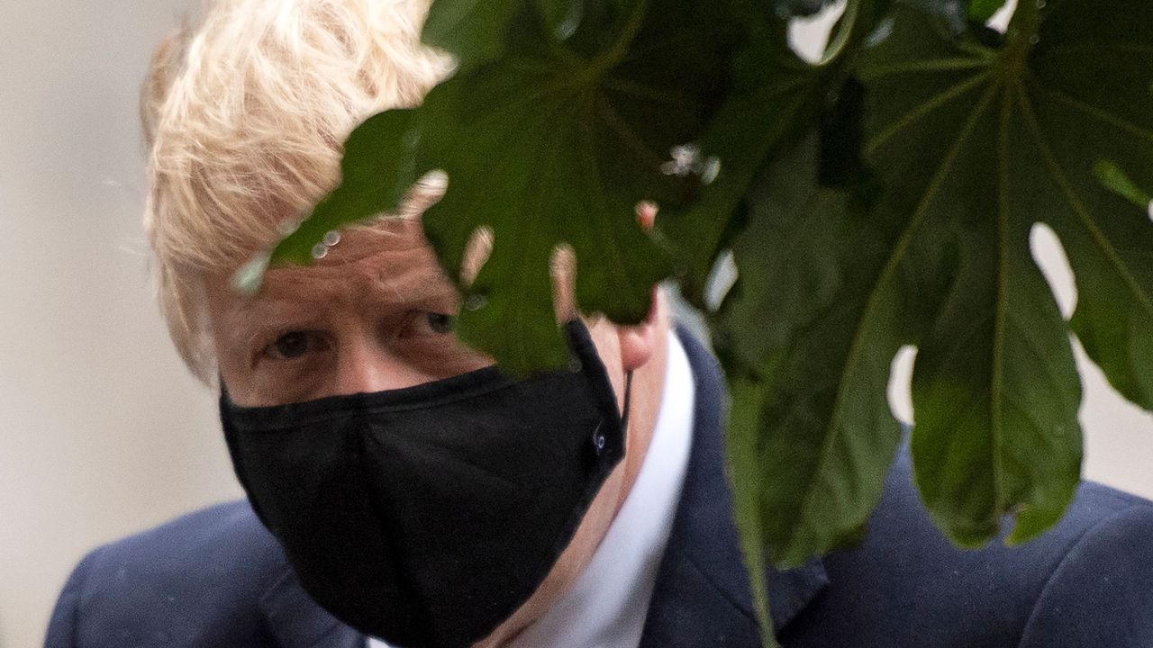 Boris Johnson wearing a face mask.