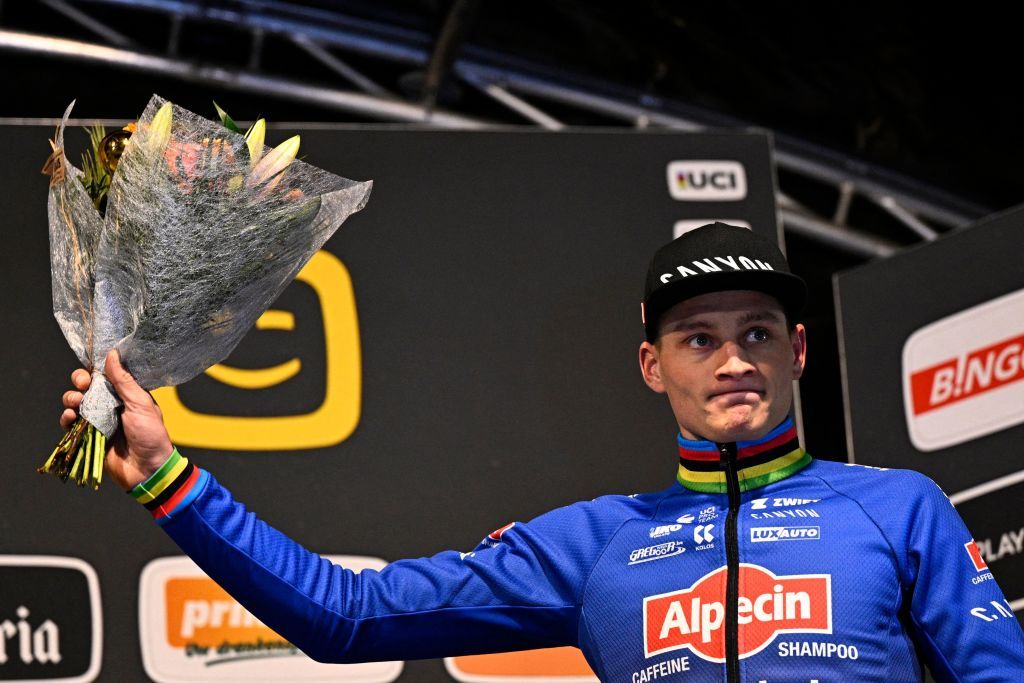 Thirddplaced Dutch cyclist Mathieu Van Der Poel poses on the podium of the Men Elite race of the Superprestige Diegem 6th stage of the Superprestige cyclocross competition in Diegem on December 28 2022 Belgium OUT Photo by JASPER JACOBS BELGA AFP Belgium OUT Photo by JASPER JACOBSBELGAAFP via Getty Images