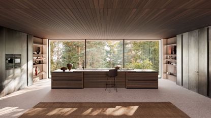 A spacious, bright, open concept kitchen with a long island, and shelving on either side of the room